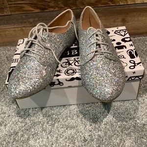NIB silver sparkle shoes size 9.  39
